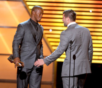 Thomas-and-Tebow.jpg
