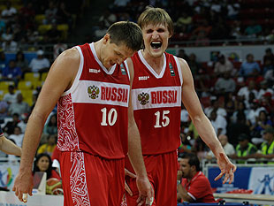 Kirilenko-right-is-the-laugh-and-the-roar-but-Khyrapas-the-head-down-plugger.-AP.jpg